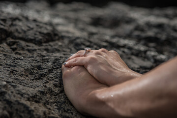 hands on sand