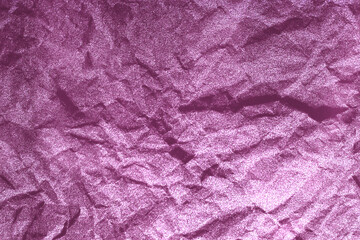 Background with crumpled, battered, lilac pink fabric material with copy space.Empty blank backdrop