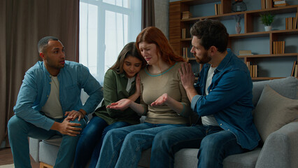 Upset woman cry desperate bullying at home multiethnic team friends support sad anxious girl on group psychological therapy colleagues women and men calming stressful teammate provide help supporting