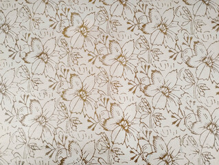 Vintage plaster with golden floral pattern