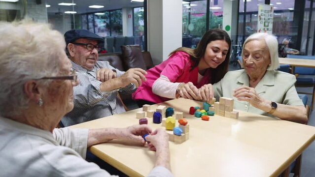 Nurse and ole people resolving a skill games