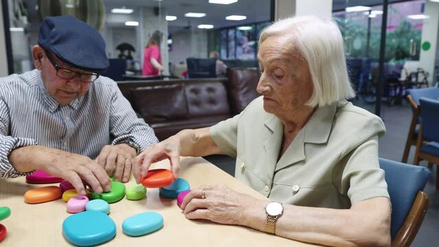 Old people resolving brain skill games in a nursing home