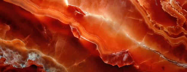 Closeup of a polished Carnelian red agate texture on a black background panorama copy space - obrazy, fototapety, plakaty