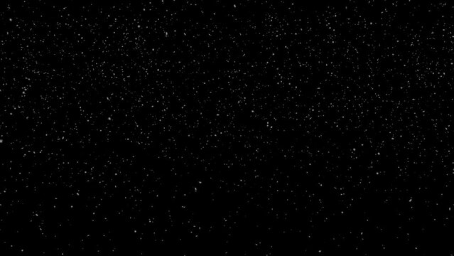 Snowflakes falling on black background usable as an overlay for winter or Christmas motion graphics
