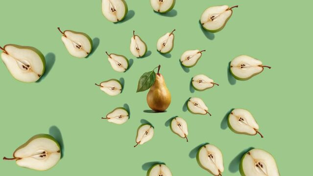 Stop motion Cut and whole Pear appear and disappear on pastel background. High quality video 4K. Detailed stop motion video. Background or wallpaper in food and drinks videos.