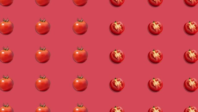 Stop motion Cut and whole Tomato appear and disappear on pastel background. High quality video 4K. Detailed stop motion video. Background or wallpaper in food and drinks videos.