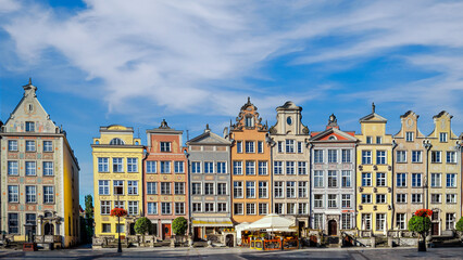 Historical houses in old town center of Gdansk, Poland, on a bright sunny day. Panorama image.