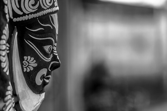 Black and white mask against a blurry background. Purulia, West Bengal, India.