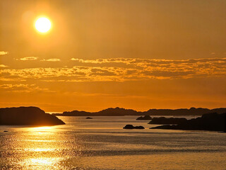 Sunset over islets in norway fjord near Haugesund - 672924544