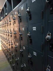 metal lockers with locking latches in an office building
