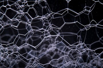 Grayscale of soap bubbles isolated on dark background