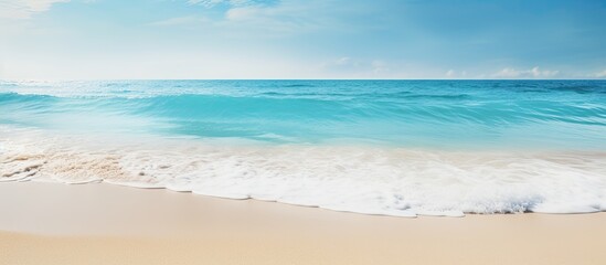 Gentle undulations on a sun kissed shore of a tropical paradise