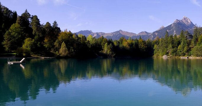 Scenic landscape of Urisee lake in Austria with perfect reflection's.