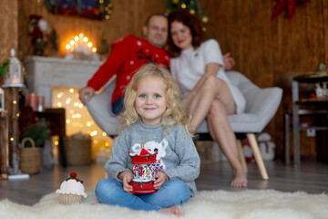 Fototapeta na wymiar Happy family on Christmas at home