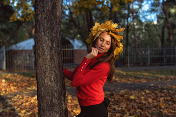 Young woman in the city garden