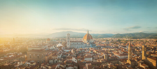 Florence sunset city skyline with Cathedral and bell tower Duomo. Florence, Italy.  Background on the theme of history, culture, etc. - obrazy, fototapety, plakaty