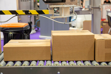Cardboard boxes on industrial packaging tape.