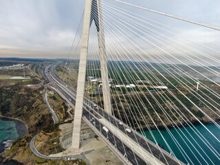 Suspension bridge vehicle traffic aerial view