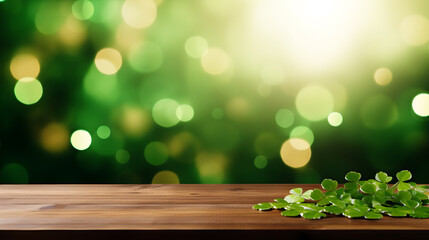 Empty wooden table mockup with defocused green and gold background, shamrock and golden glitter for...