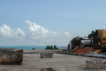view of the beautiful landscape of the city of cartagena, sea from the walls with colonial architecture and blue city houses