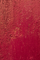Red concrete surface background. Texture, copy space