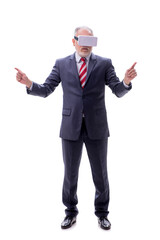 Old businessman wearing virtual glasses isolated on white