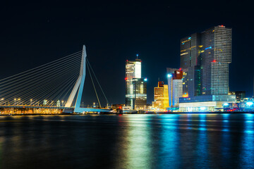 Fototapeta na wymiar Spectacular Night View of Rotterdam from the Sea: Experience the Beauty of the City at Night.