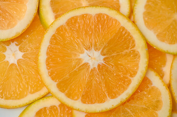 sliced ​​orange laid out on the table as a food background 11