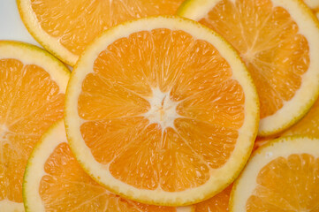 sliced ​​orange laid out on the table as a food background 10