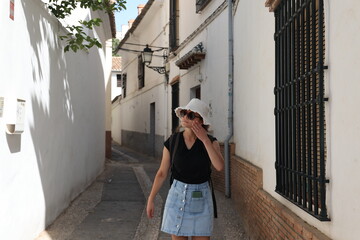 Women in a street in the town of Granada, Andalusia, Spain