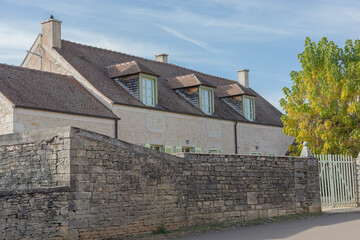 House behind a wall in the Burgundy region vineyards