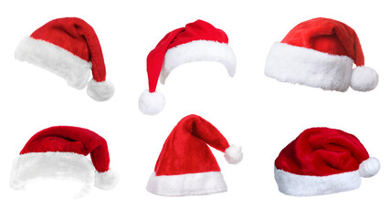Red Christmas and New Year's hats. Transparent background.