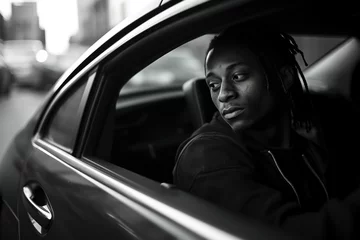 Foto op Aluminium Young drug dealer or junior gang member sitting in his vehicle © Kondor83