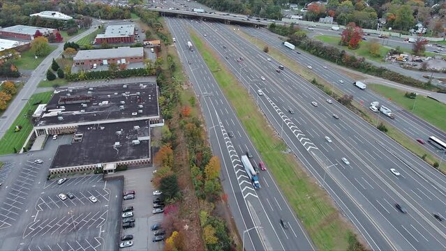 This is view from an of American freeway I-95 NJ Turnpike with heavy traffic moving quickly