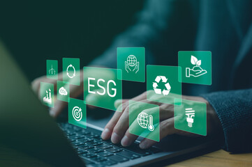 man use computer to analyze ESG, ESG environment social governance investment business concept. ESG...