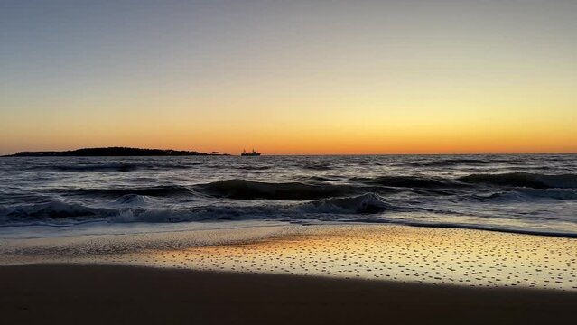 Sunset. Uruguay. Ship. Ocean.