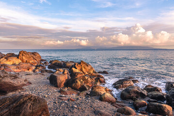 Fototapeta na wymiar Scenic rock formation during sunrise at the beach of Mindoro, Philippines