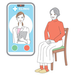 スマートフォンでオンライン診療を受けるシニア女性