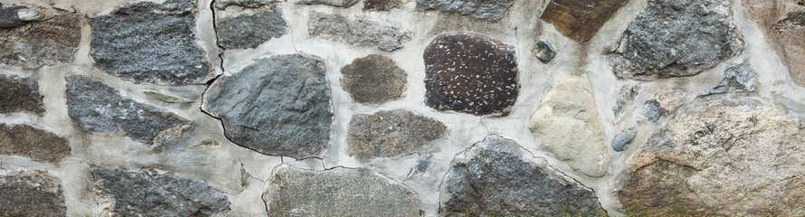textured stone surface, showcasing natural patterns and earthy hues