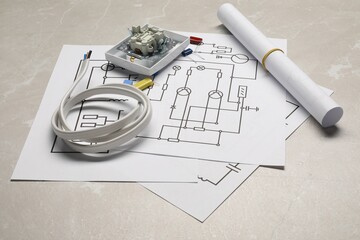 Wiring diagrams, wires and disassembled light switch on table