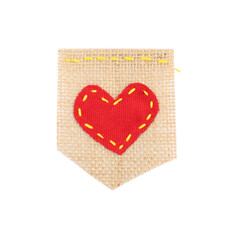 Piece of burlap fabric with heart isolated on white, top view