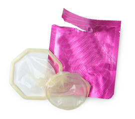 Unpacked female condom and torn package isolated on white, top view. Safe sex