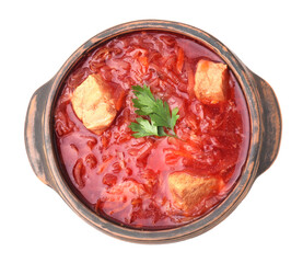 Tasty borscht in bowl isolated on white, top view