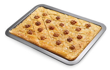 Delicious baklava with walnuts in baking pan isolated on white