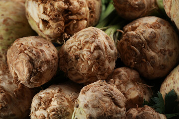 Fresh raw celery roots as background, closeup
