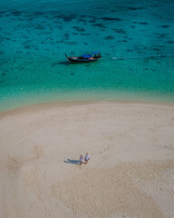 Fototapeta na wymiar Koh Lipe Island Southern Thailand with turqouse colored ocean and white sandy beach at Ko Lipe