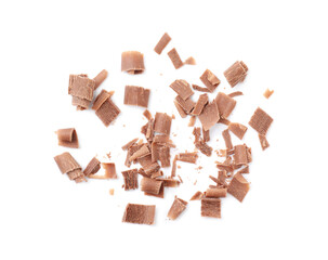 Many tasty chocolate shavings isolated on white, top view