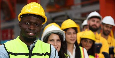 engineer team or worker team  with safety uniform standing at industry.