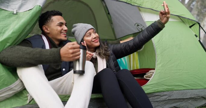 Happy couple, tent and camp for selfie, photograph or social media in relax on vacation or holiday in nature. Man and woman smile for photo, travel or enjoying camping together in the outdoors