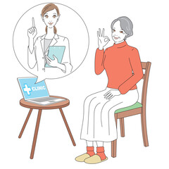 スマートフォンでオンライン診療を受けるシニア女性